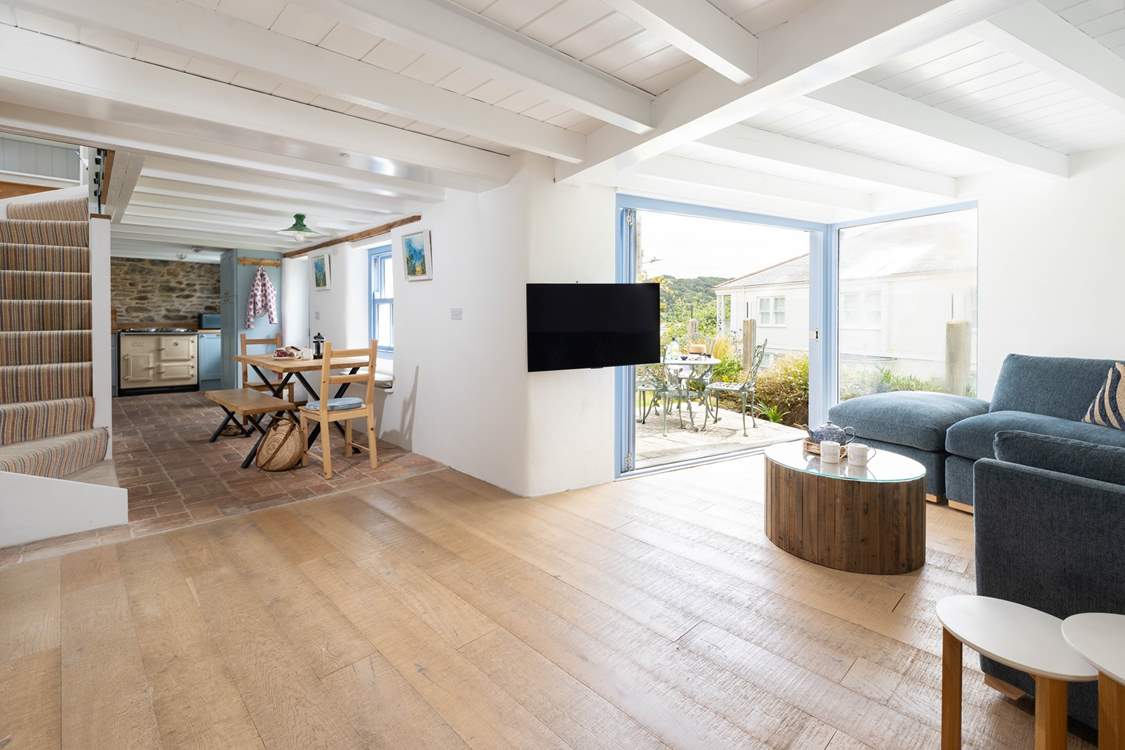 Enjoy opening the bi-fold doors and the summer breeze floating in.