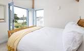 Upstairs the principal bedroom looks out over the creek and garden.  - Thumbnail Image