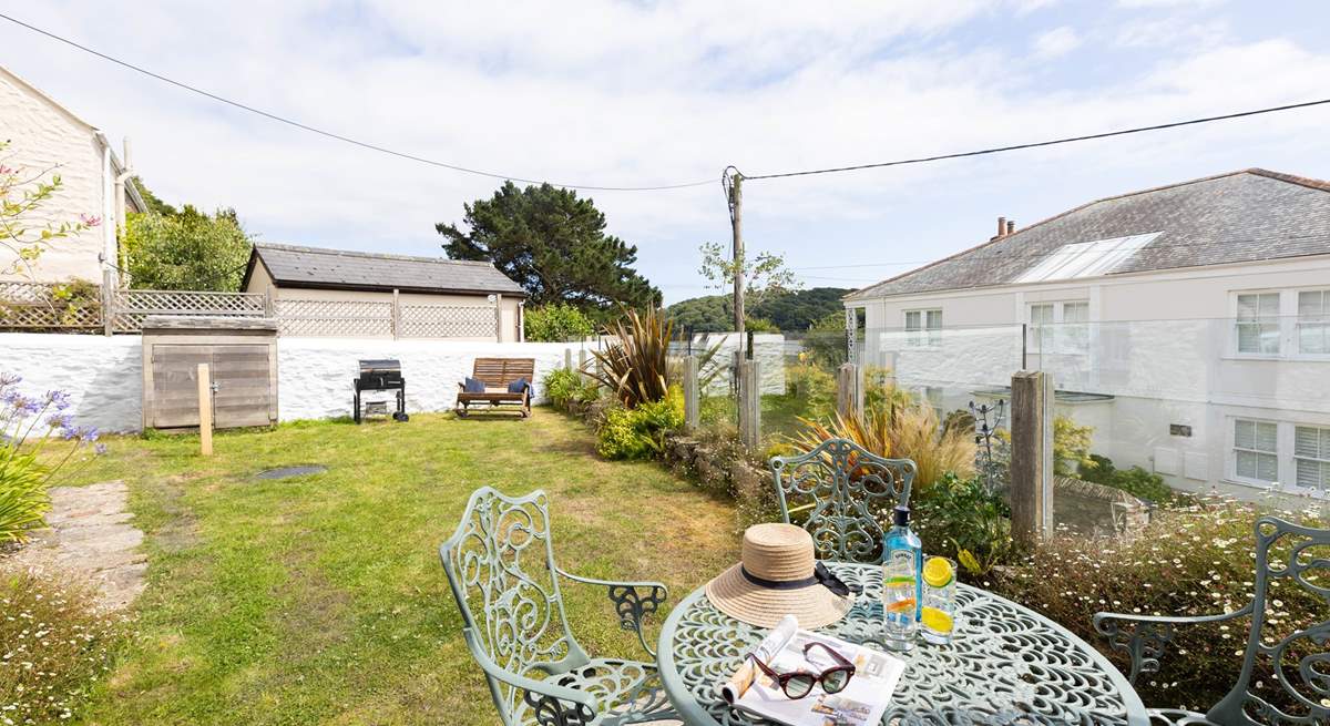The enclosed garden is such a suntrap. 