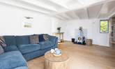 The sitting room is ever so cosy with the wood burner lit.  - Thumbnail Image