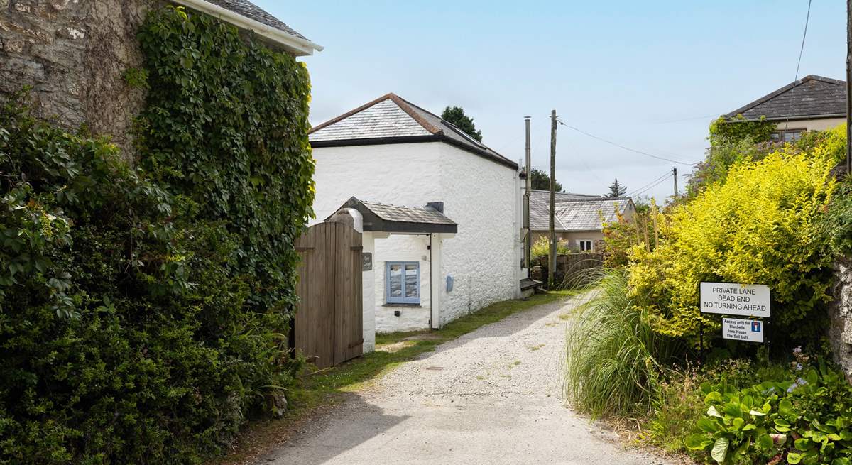 Quay Cottage is at the start of a private lane. 