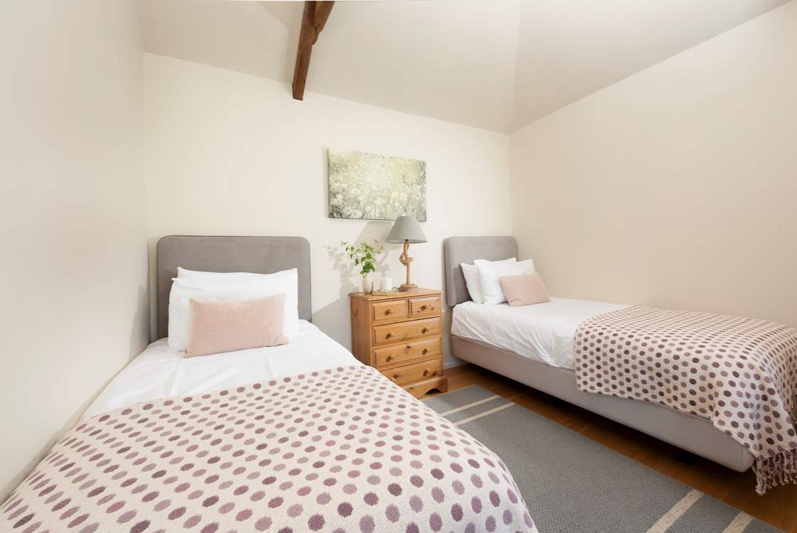 The twin bedroom can be found on the first floor.