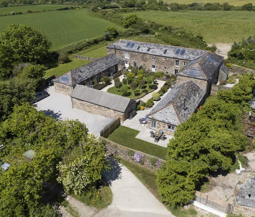 Set in the rural hamlet of Tredinnick, The Milk Shed sits around a central courtyard with four other properties, each with their own private garden.