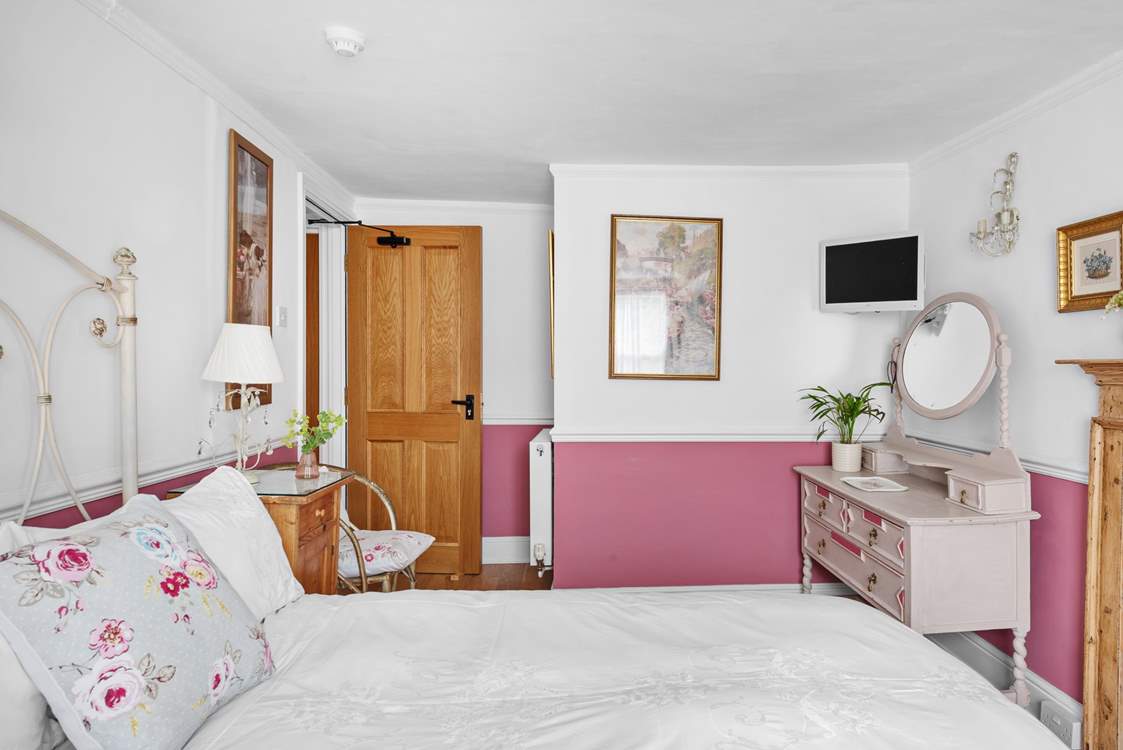 Such a pretty room, beautifully furnished to complement the period of the house.