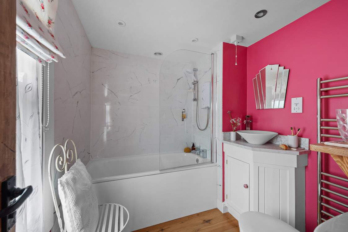 You'll be pretty in pink in the en suite bathroom of Bedroom 2.
