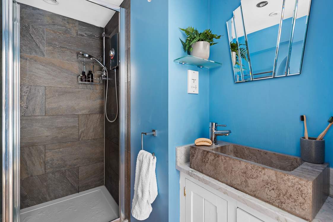 Bedroom 1 has an en suite shower-room.