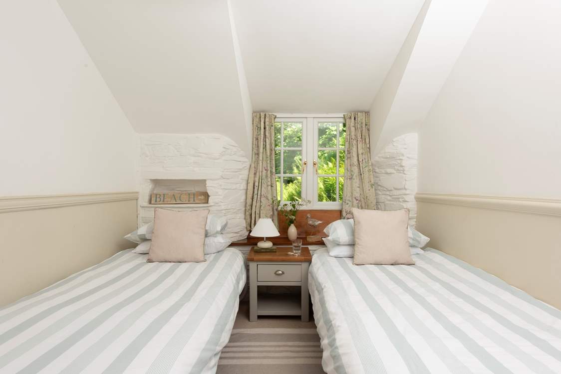 A pretty twin bedroom.