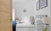 Let's take a peek into bedroom 1. - Thumbnail Image
