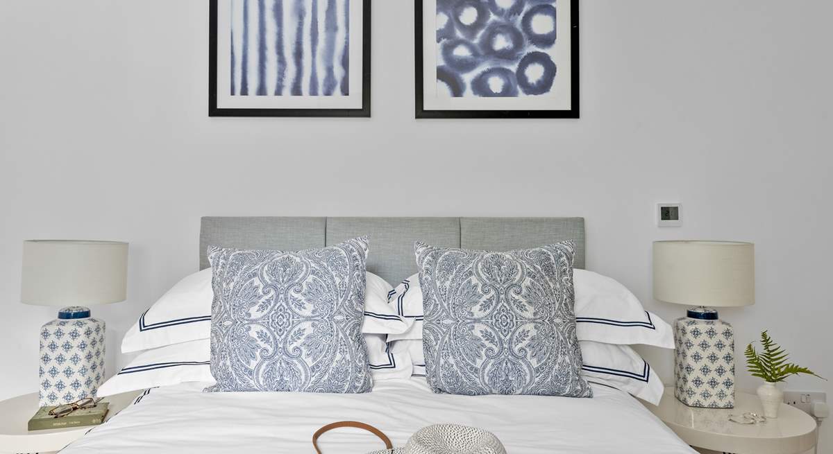 Snuggle under the covers of the comfy double bed.