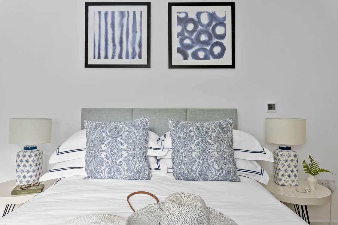 Snuggle under the covers of the comfy double bed.
