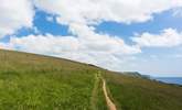 Take to the coastal footpath to discover visual treats around every corner. - Thumbnail Image