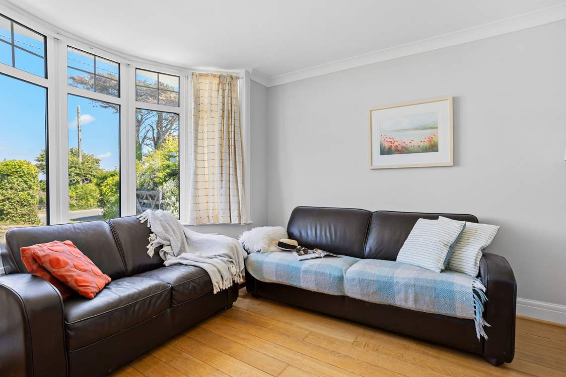 The separate sitting-room is the place to relax weary limbs after a day of adventure in north Cornwall.