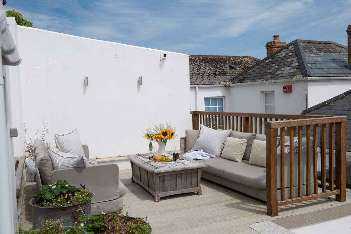 Steps lead to the sunny terrace where you can enjoy the Cornish fresh air.