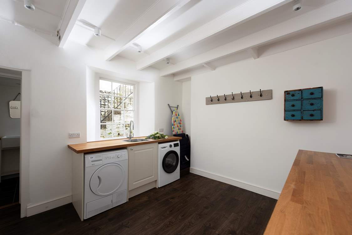 Plenty of space for storing coats, wellies and beach gear here.