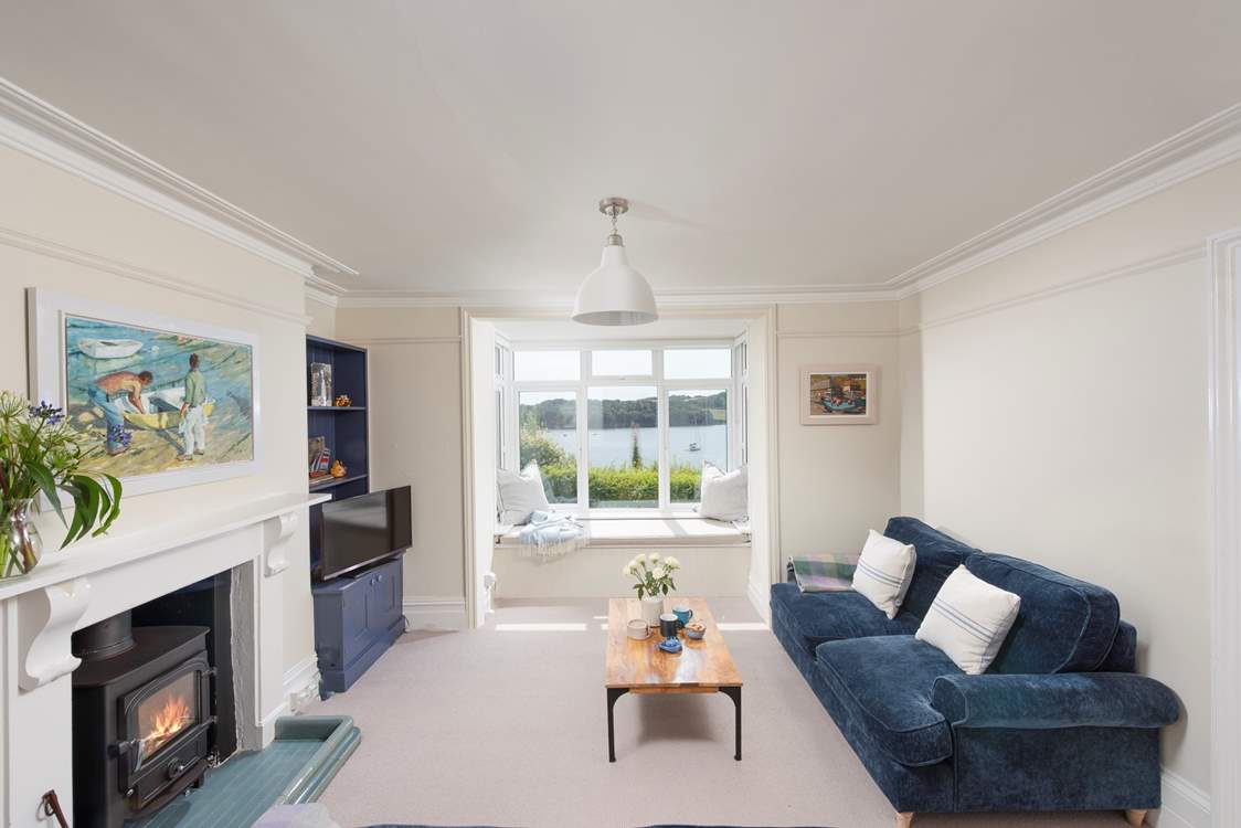 Both the sitting-room and the dining-room enjoy gorgeous views across the bay.
