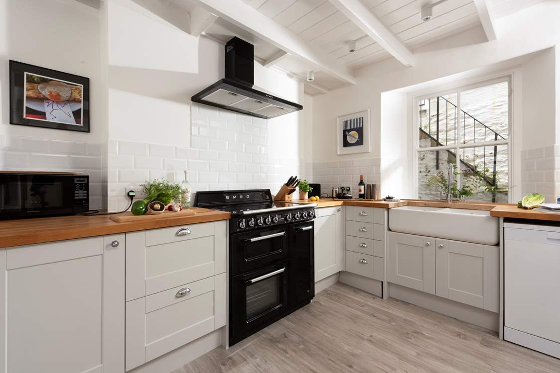The kitchen, which is located to the rear, is beautifully crafted.