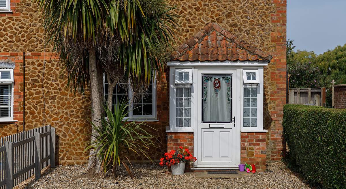 Located in a row of pretty Carrstone cottages.