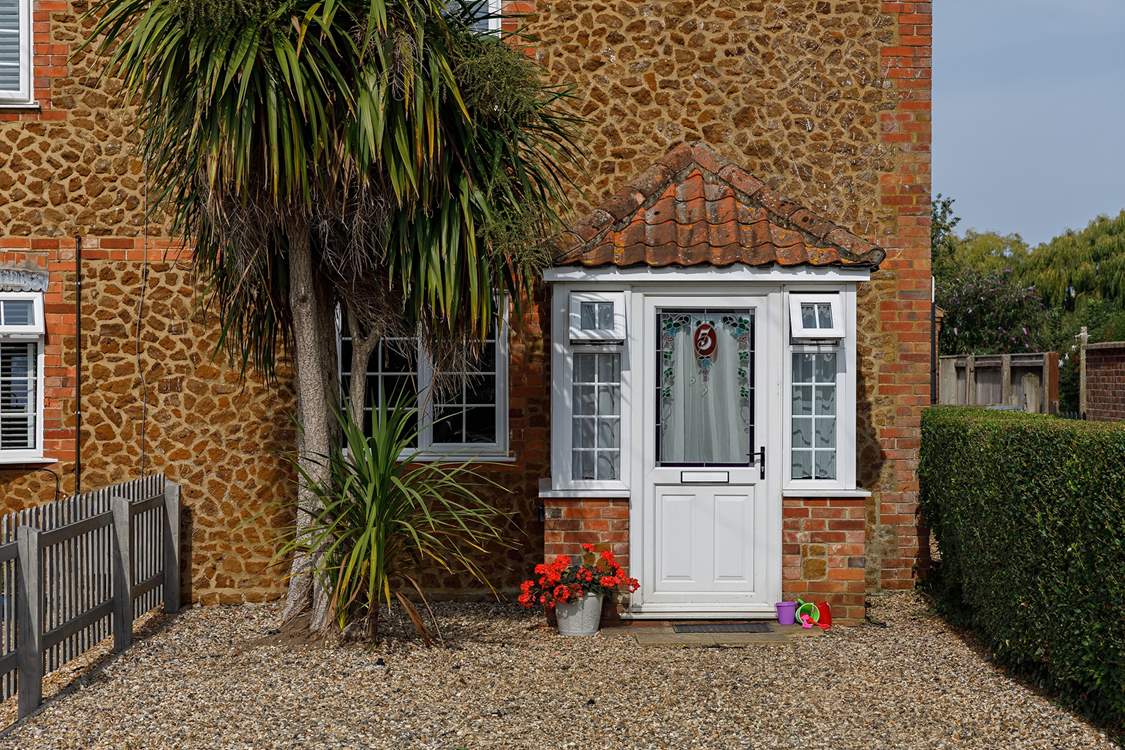 Located in a row of pretty Carrstone cottages.