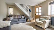 The sitting-room is beautifully furnished.