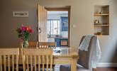 The separate dining-room sits in between the sitting-room and kitchen.  - Thumbnail Image
