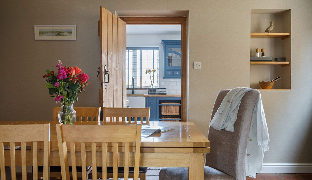 The separate dining-room sits in between the sitting-room and kitchen. 