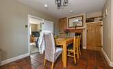 The well-preserved original tiled floor flows through the kitchen and dining-room.  - Thumbnail Image