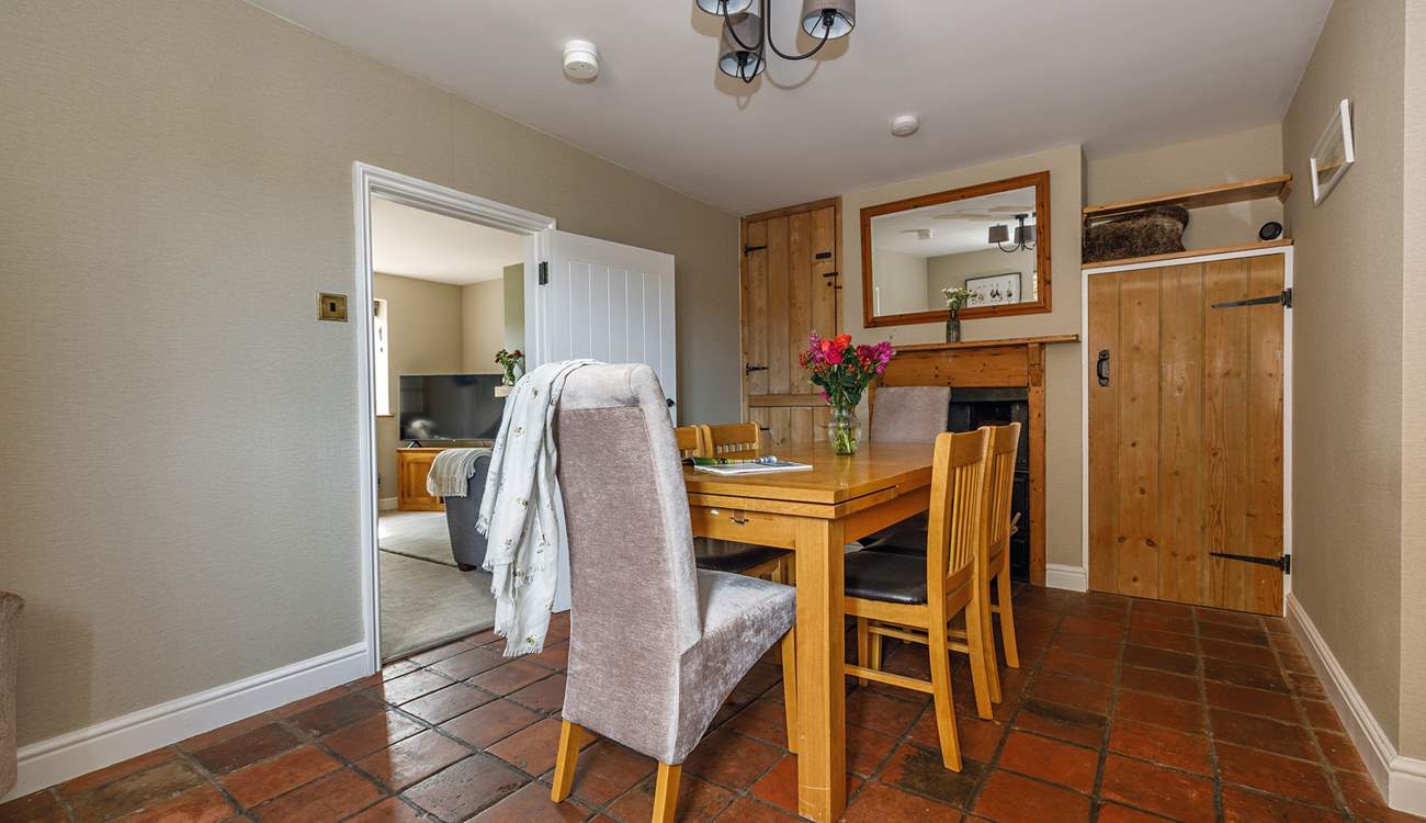 The well-preserved original tiled floor flows through the kitchen and dining-room. 