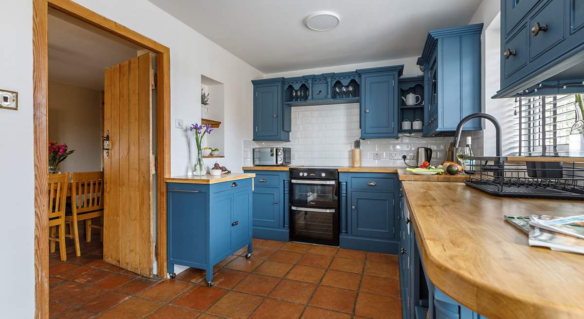 The kitchen is beautifully styled and well-equipped.