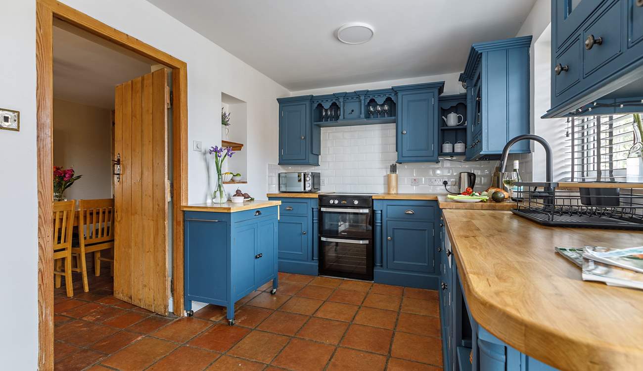The kitchen is beautifully styled and well-equipped, with practical tiled flooring remember to pack your slippers or flip-flops!