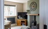Warm your toes by the wood-burner during cooler months.  - Thumbnail Image
