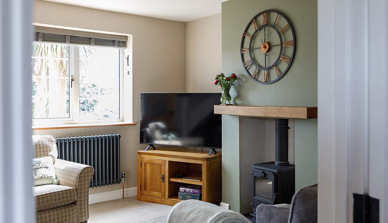 Warm your toes by the wood-burner during cooler months. 