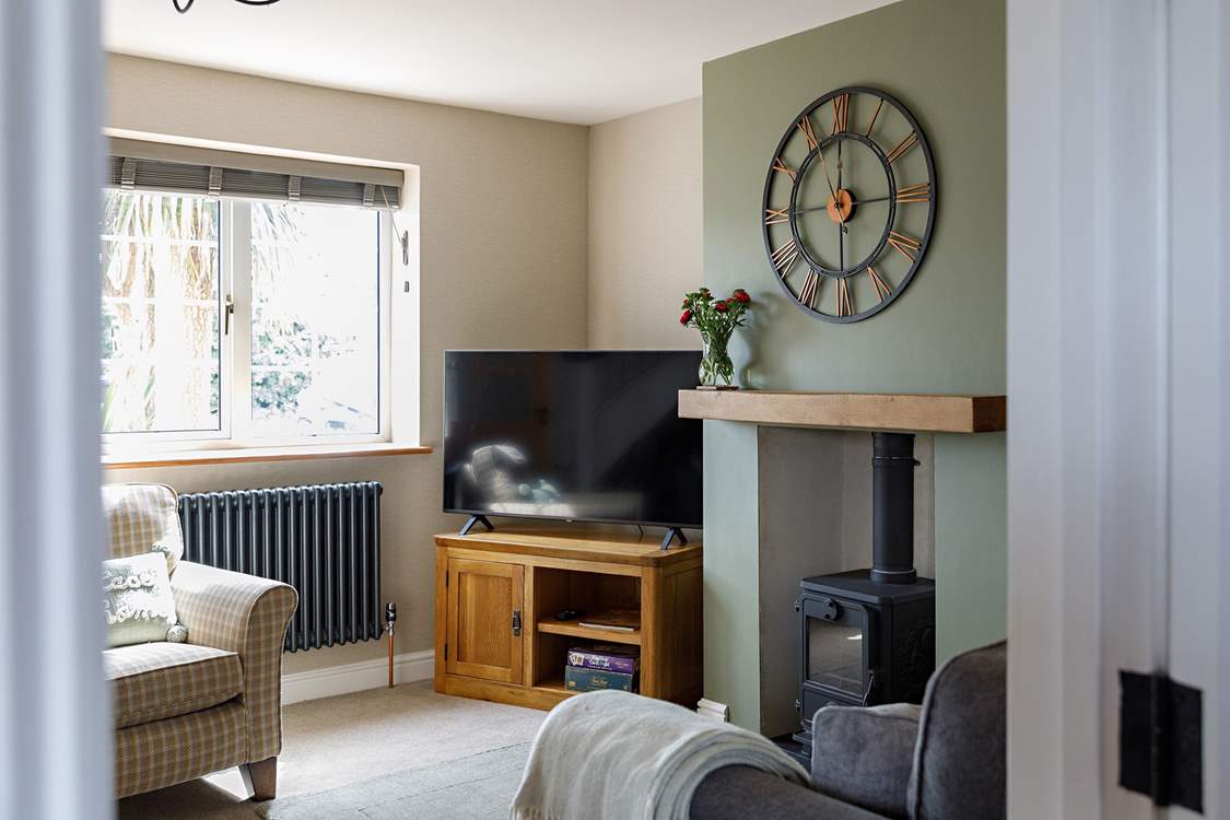 Warm your toes by the wood-burner during cooler months.