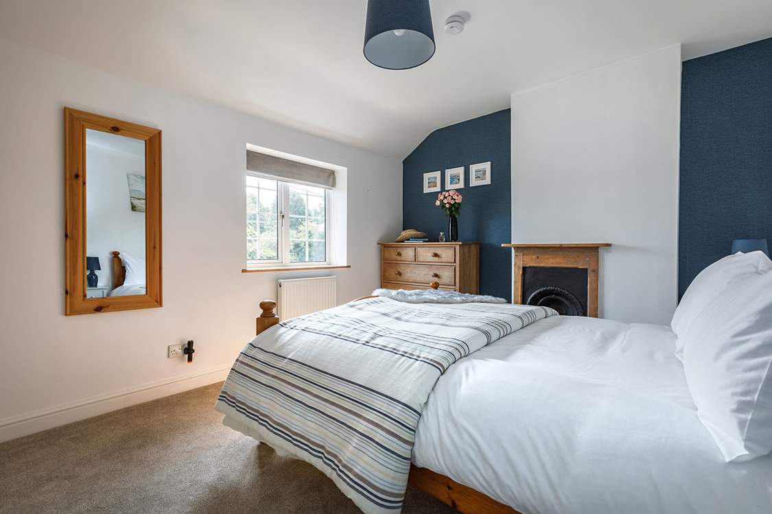 Lovely linens await in the bedrooms.