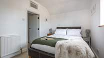 Bedroom 2 is charming with countryside views from the window.