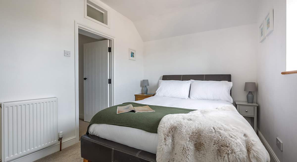 Bedroom 2 is charming with countryside views from the window.