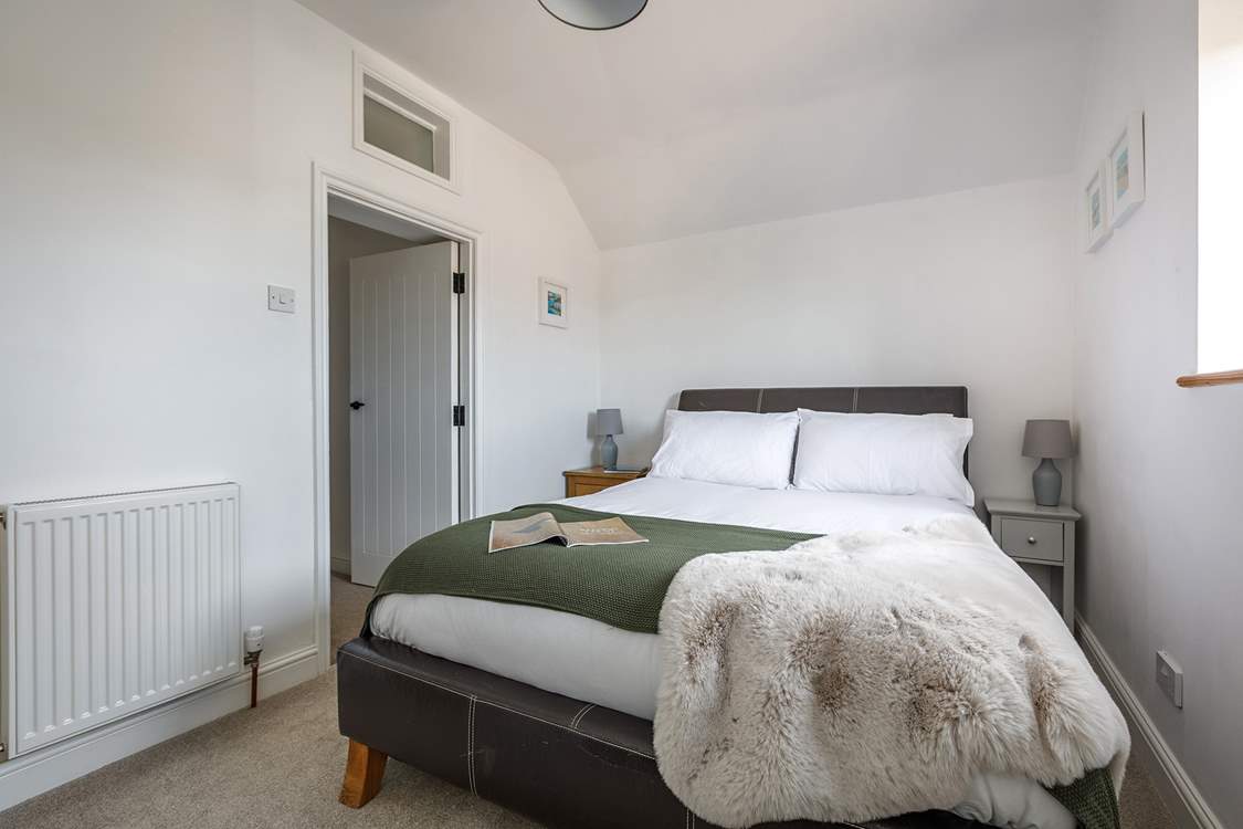 Bedroom 2 is charming with countryside views from the window.