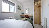 A quiet corner in bedroom 2, perfect if work calls. 