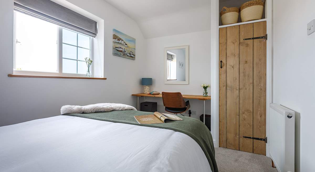 A quiet corner in bedroom 2, perfect if work calls. 