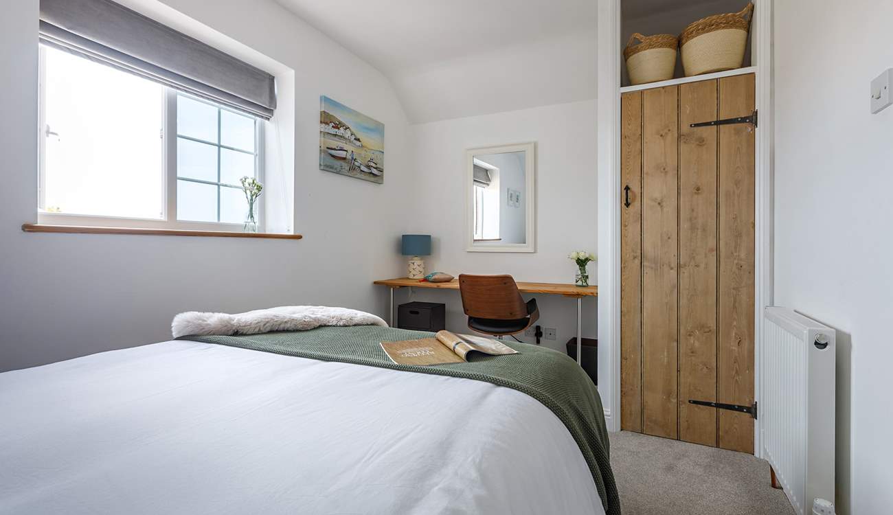 A quiet corner in bedroom 2, perfect if work calls. 