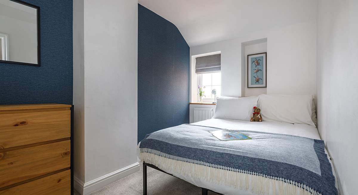 Cool and inviting colours in bedroom 3.