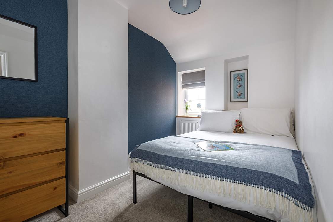 Cool and inviting colours in bedroom 3.