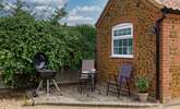 A quiet corner behind the annexe, Garden Retreat, ideal for your morning cuppa or barbecue.  - Thumbnail Image