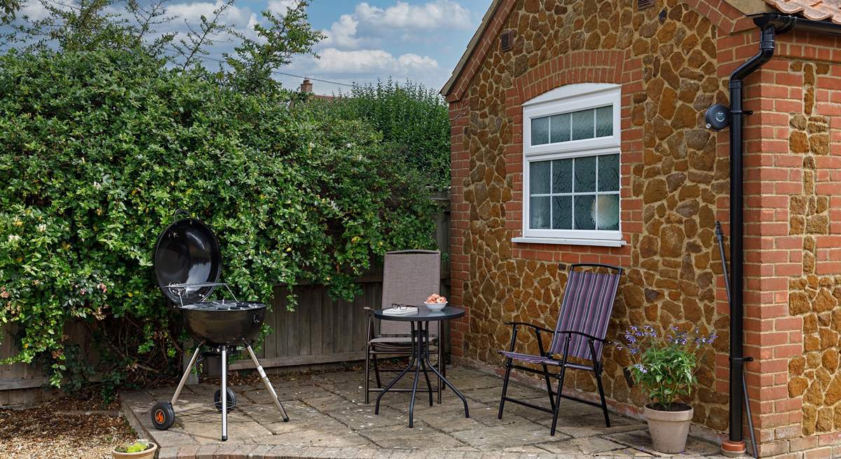 A quiet corner behind the annexe, Garden Retreat, ideal for your morning cuppa or barbecue. 