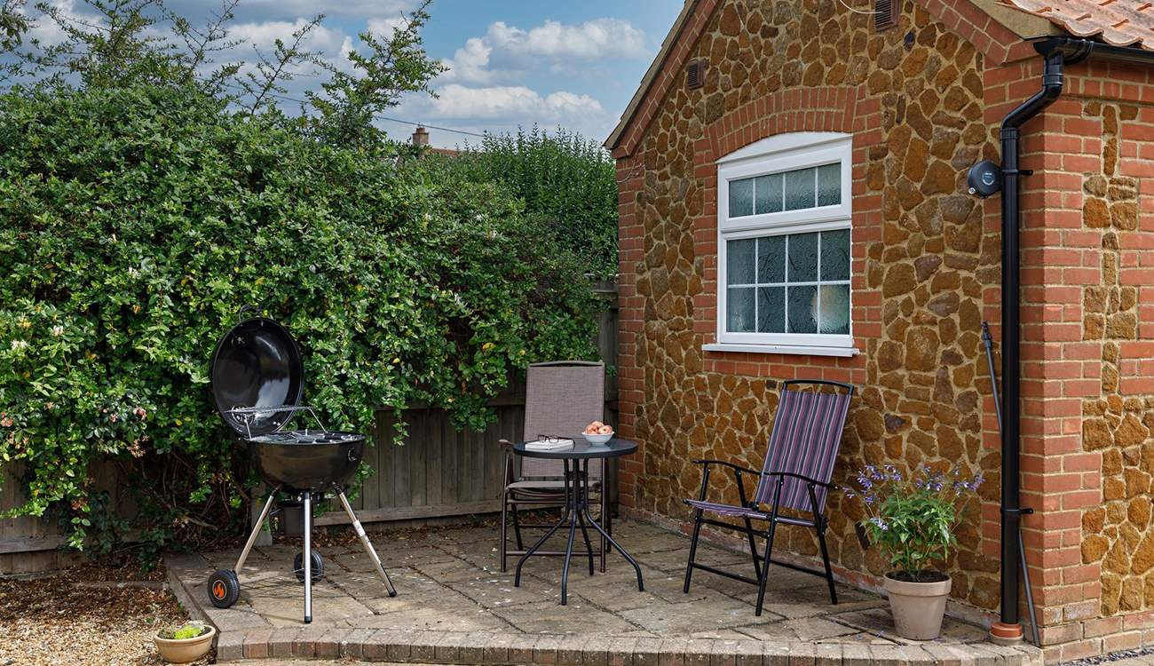 A quiet corner behind the annexe, Garden Retreat, ideal for your morning cuppa or barbecue. 