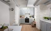 The dining-table is perfectly placed for sociable meals.  - Thumbnail Image