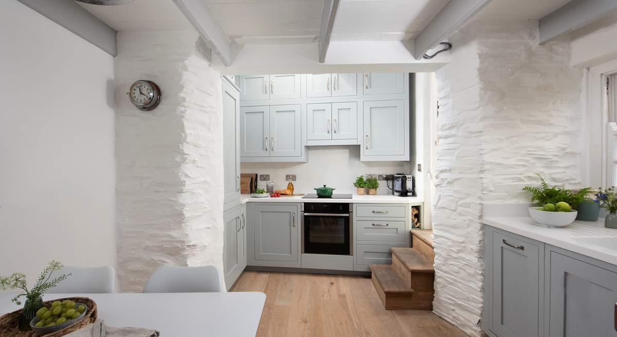 The dining-table is perfectly placed for sociable meals. 