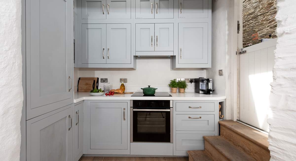 All the equipment you'll need including a slimline dishwasher. The stable-door opens to the rear side alley but there is no outside space. 