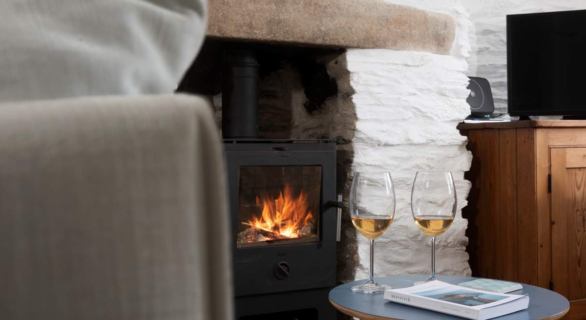 Warm your toes by the wood-burner in cooler months. 