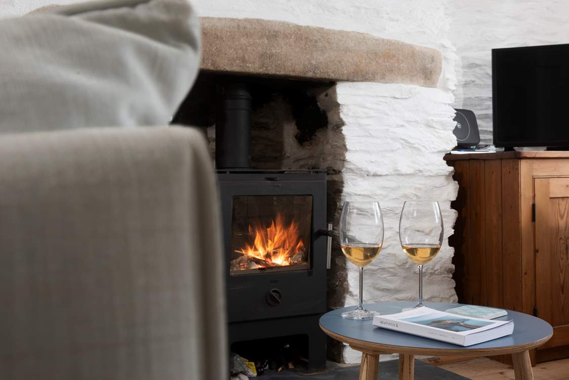 Warm your toes by the wood-burner in cooler months.