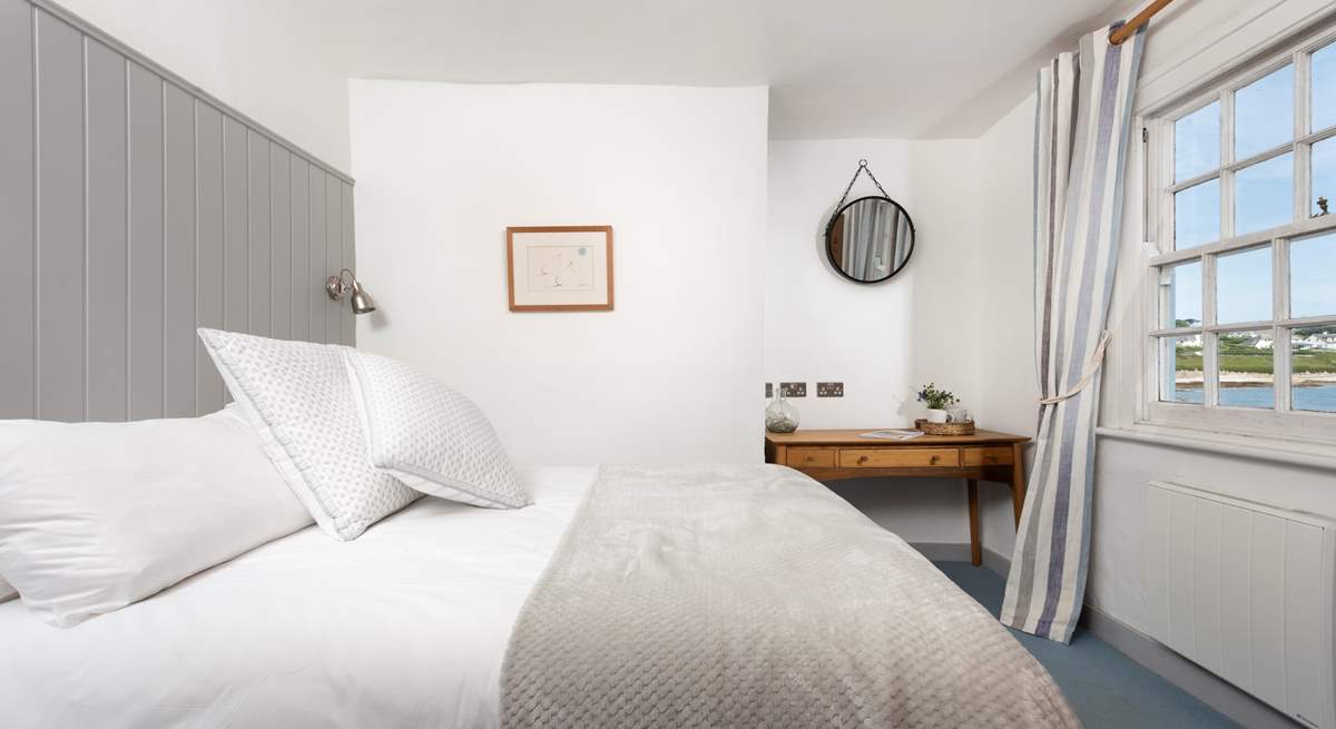 Listen to the tide ebb and flow from the double bedroom. 